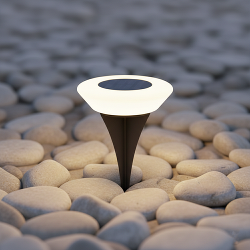Solar-powered outdoor light on pebbles with a blurred natural background