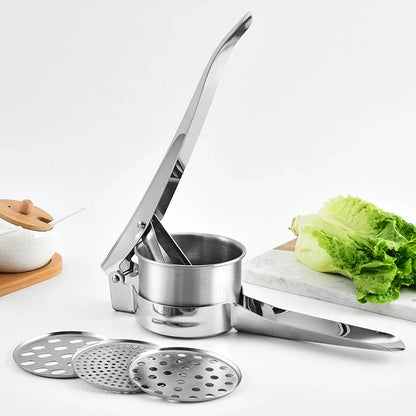 Stainless steel hand juicer with three different mesh discs on a white background