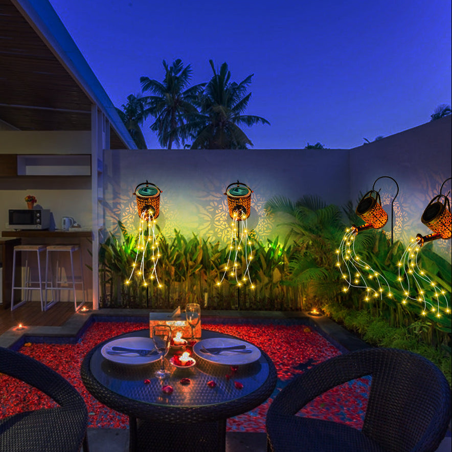 Dining area with string lights and outdoor decor at night